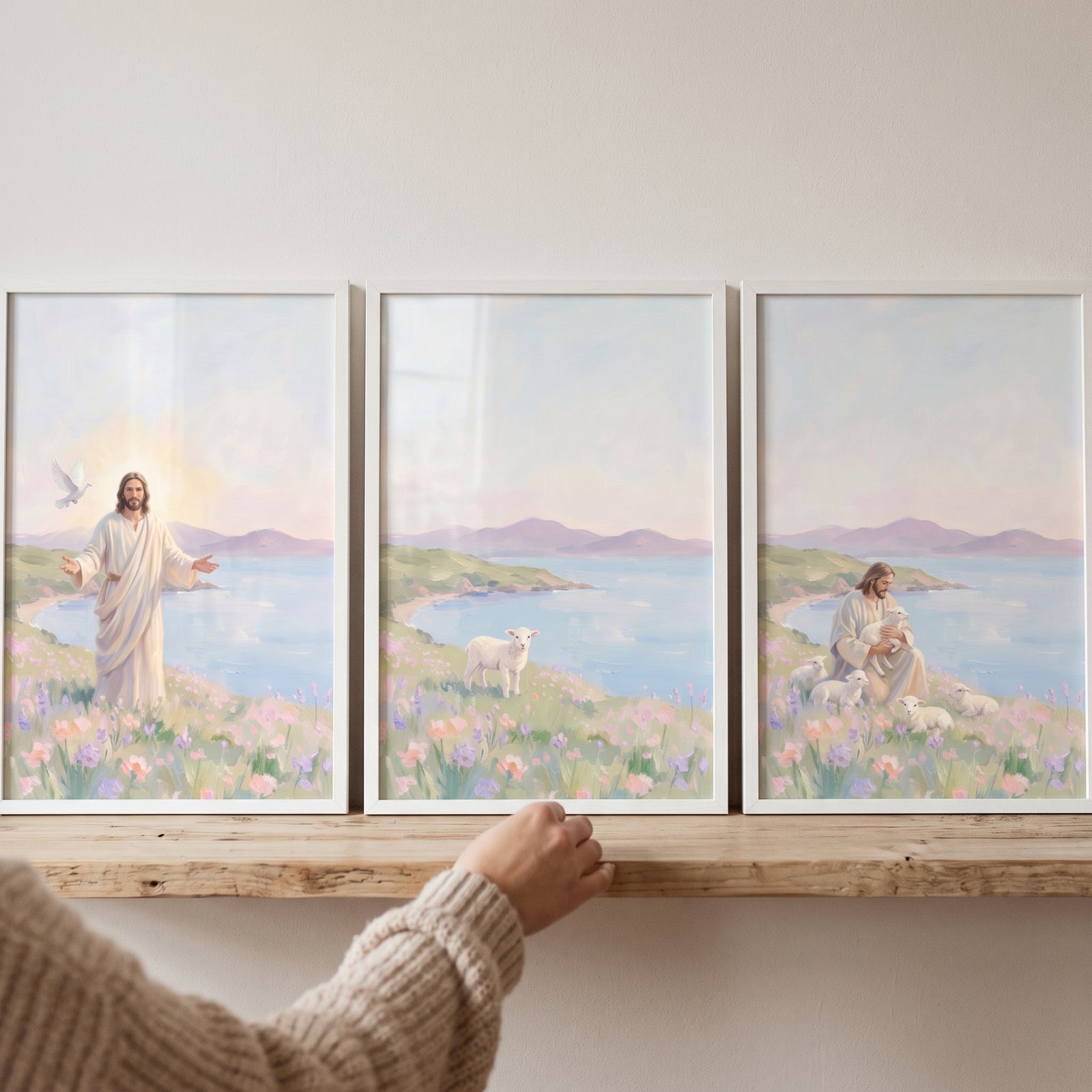 Impressionist wildflower meadow coastal wall art set of 3 featuring Jesus and lambs on a wooden shelf.