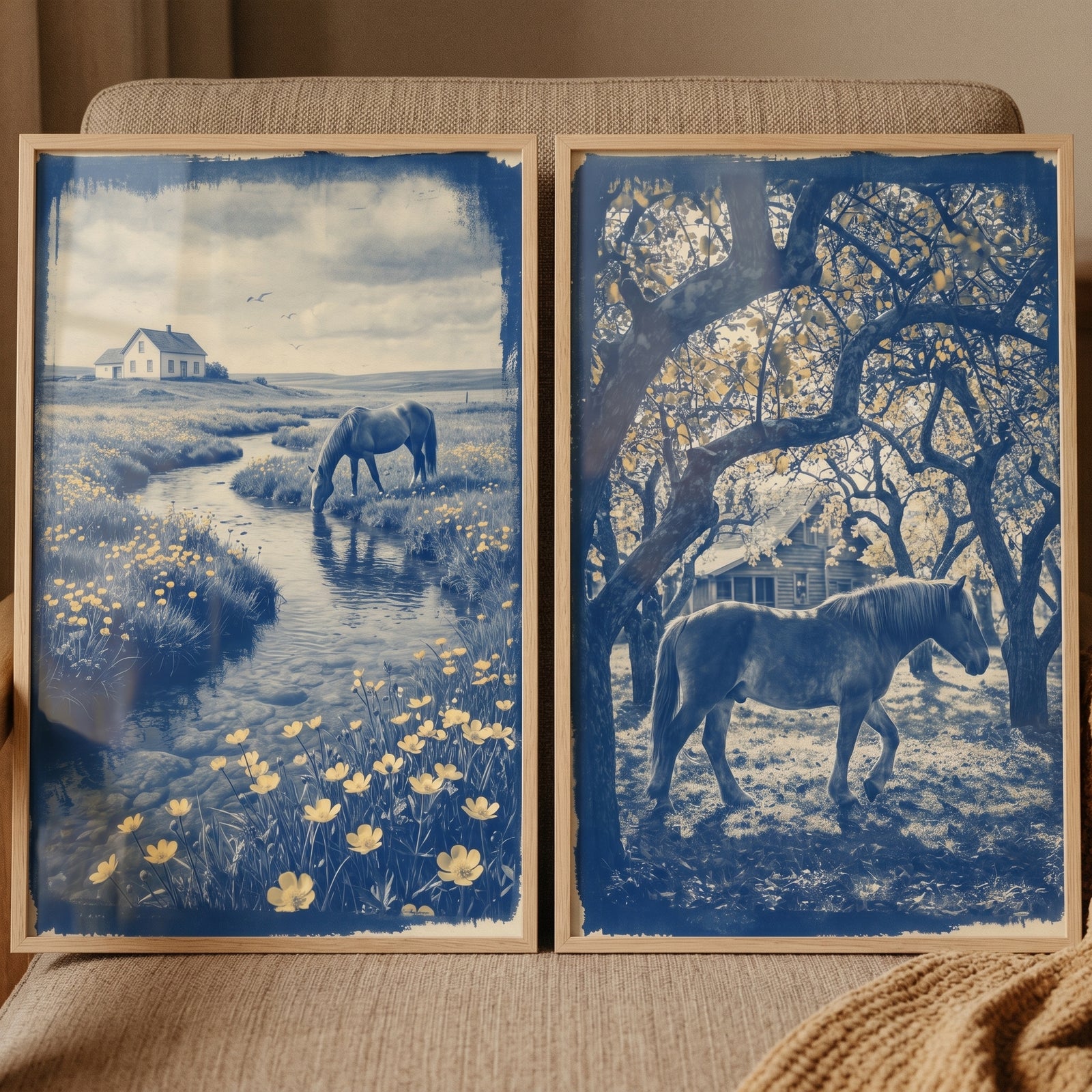 Indigo blue pastoral horse wall art set of 2 shows horses near rural homes, a winding stream, and yellow wildflowers.