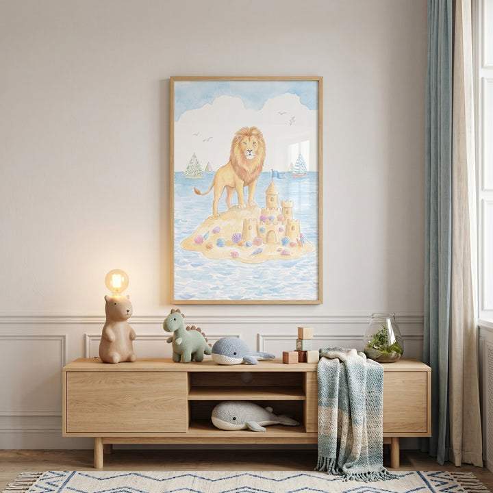 Wooden sideboard with toys and a lamp under island sandcastle beach lion wall art in a neutral nursery.