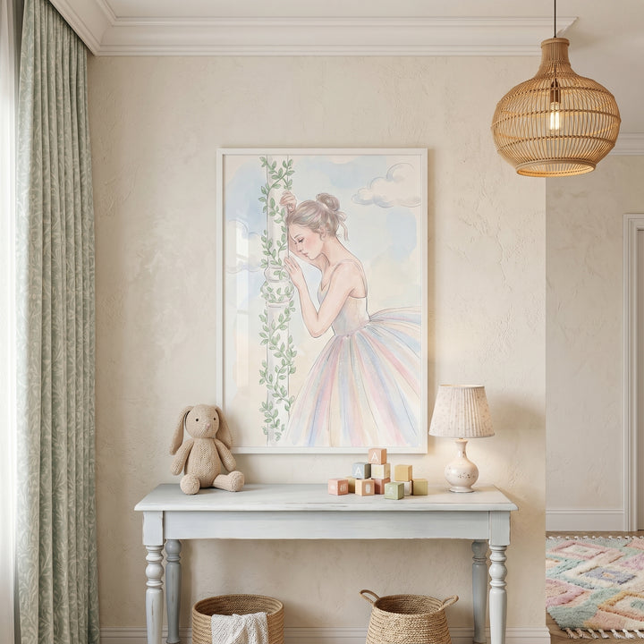 An ivy pillar ballerina artwork hangs in a nursery above a table with a stuffed rabbit and alphabet blocks.