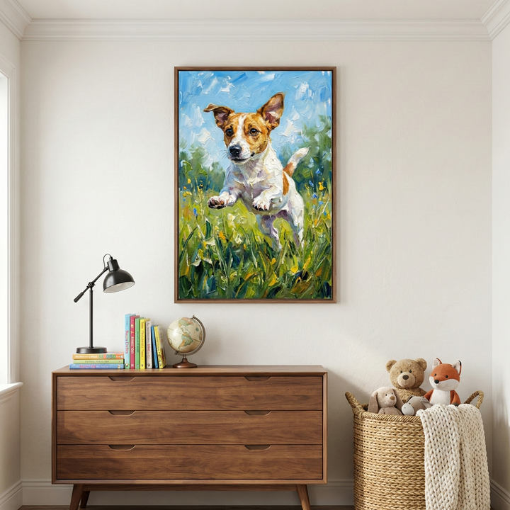 Framed impressionist style wall art of a brown and white puppy mid leap through tall green grass dotted with small yellow flowers beneath a bright blue sky. The playful pose and textured brushstrokes create a joyful outdoor scene that adds warmth and personality to a child’s bedroom with wooden furniture and soft toys.