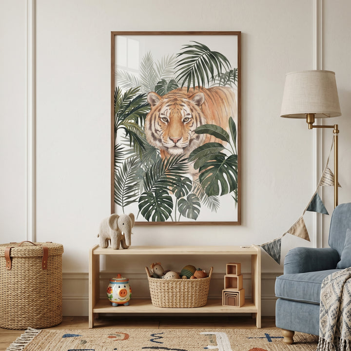 Jungle leaf tiger wall art hangs above a wooden shelf of toys in a warm nursery with a blue chair and wicker basket.