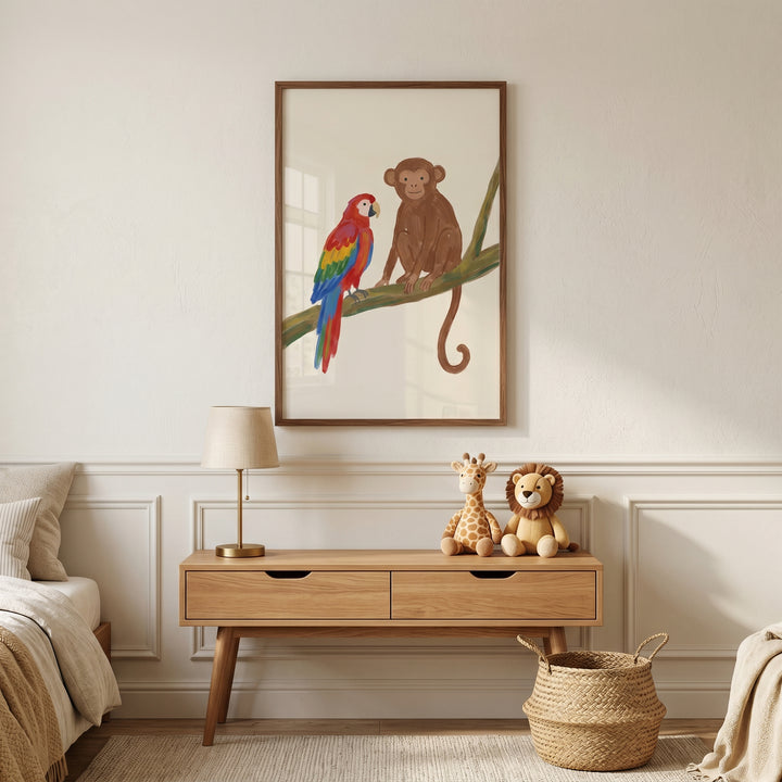 Jungle monkey and parrot animals wall art hangs above a wooden console with a lamp, giraffe, and lion plush toys.
