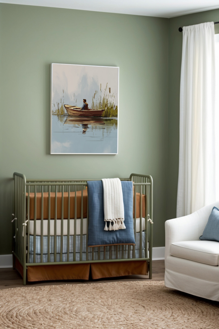 Nursery designed in earthy greens, browns, and blues, featuring a modern metal crib with comfortable bedding. Above the crib hangs a peaceful painting of a person quietly boating on calm water, complementing the tranquil feel of the space.