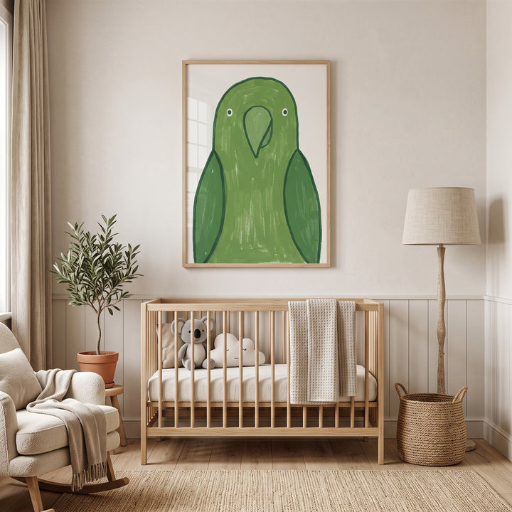 Large beak green parrot print hangs above a wooden crib in a neutral nursery with a rocking chair and floor lamp.