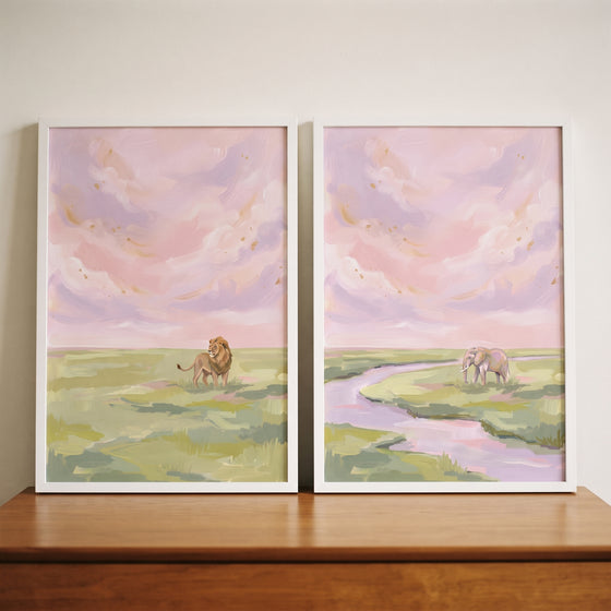 Lavender sunset safari animals wall art set of 2 featuring a lion and an elephant in a pastel landscape.