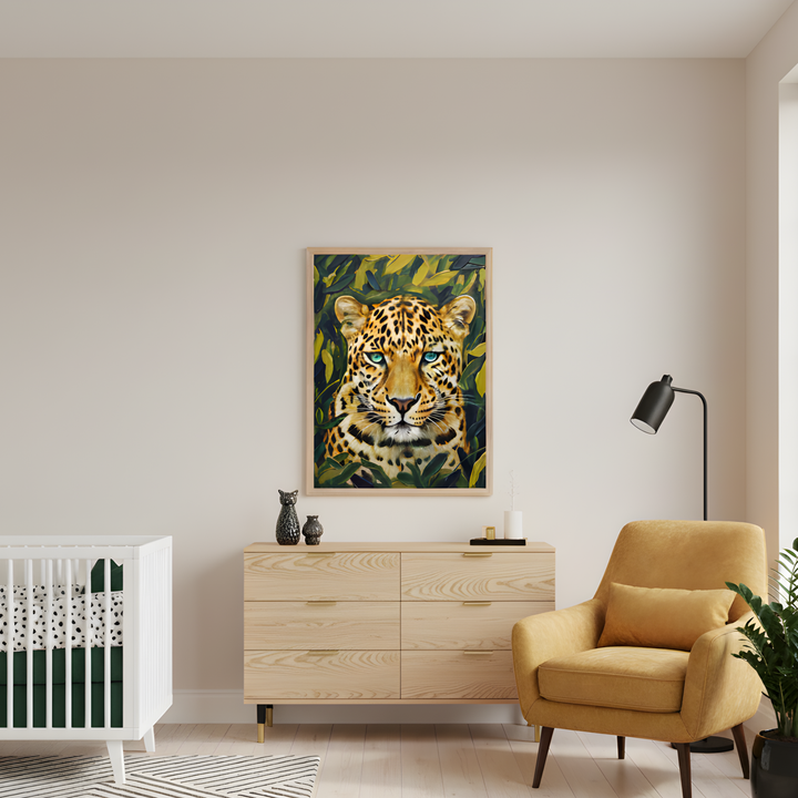 Cozy nursery or reading nook featuring a large framed leopard portrait with vivid blue eyes and lush jungle foliage, centered above a light wood dresser. The space includes a white crib, mustard-yellow armchair, and modern black floor lamp, creating a warm, stylish atmosphere.