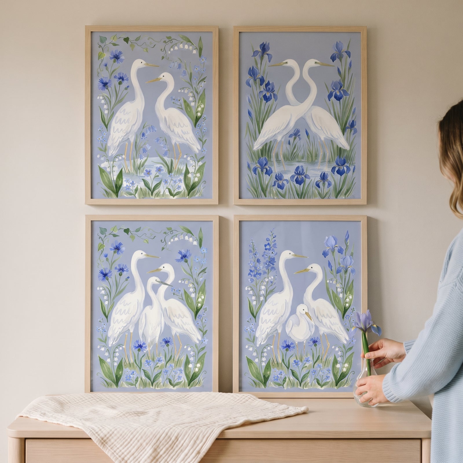 Light blue garden egret bird wall art set of 4 in wood frames, showing white birds among blue flowers.