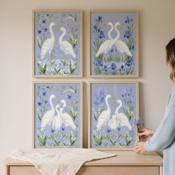Light blue garden egret bird wall art set of 4 in wood frames, showing white birds among blue flowers.