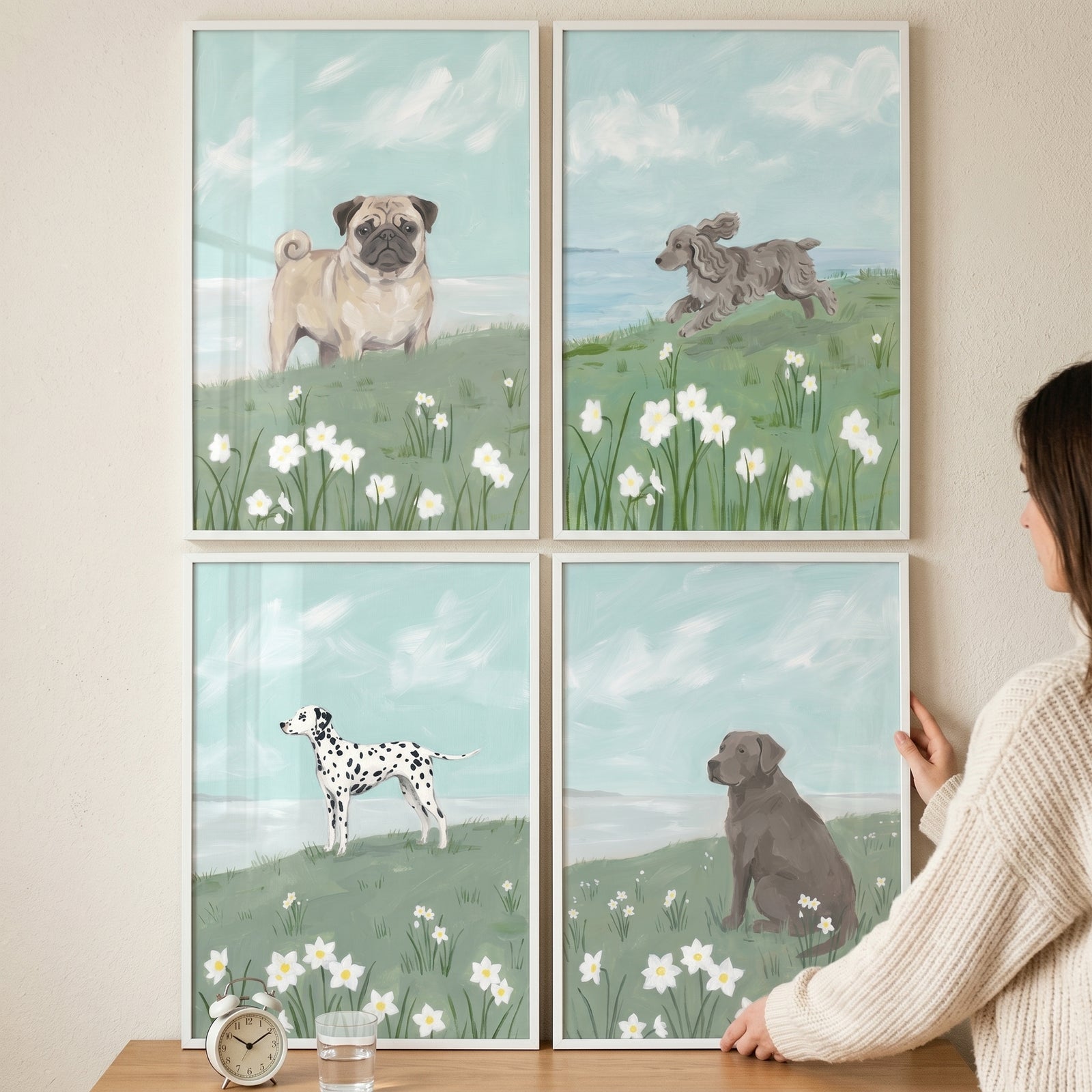 Light blue sky dog wall art set of 4 featuring a pug, spaniel, dalmatian, and labrador in floral fields.