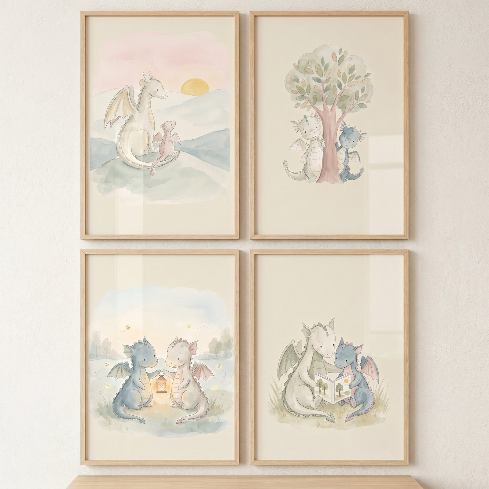 Light wash baby dragons wall art set of 4 featuring watercolor scenes of cute dragons reading and playing together.