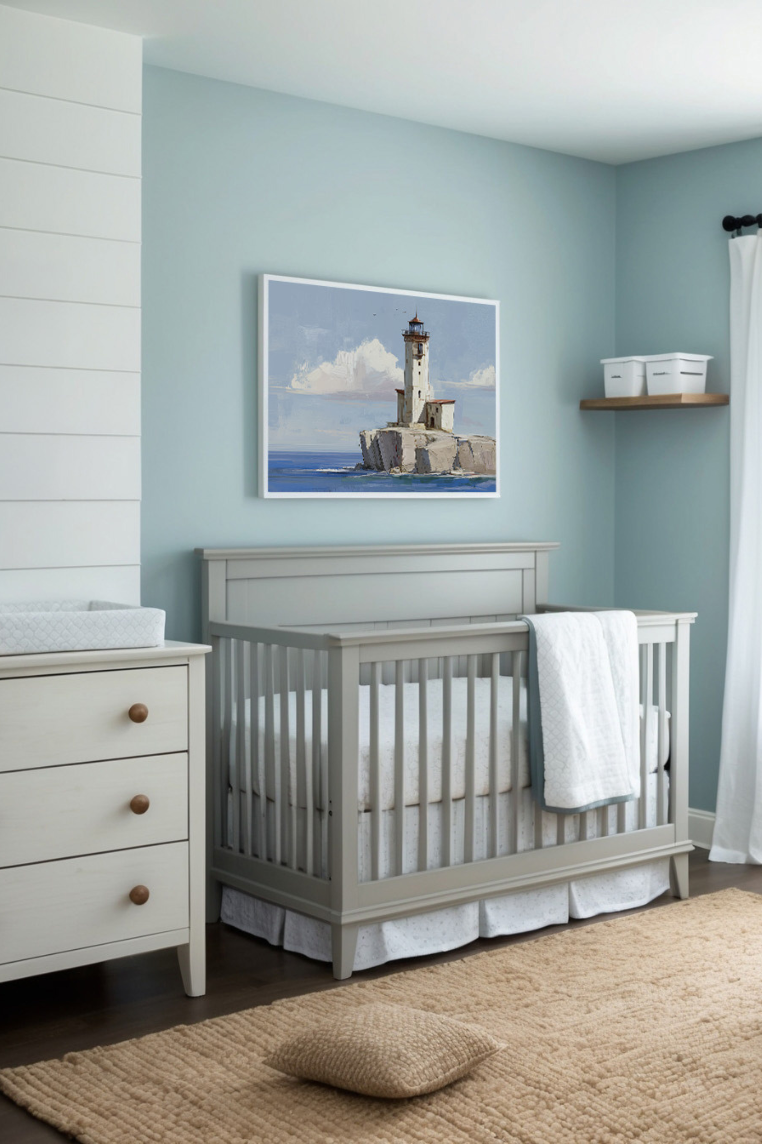Serene nursery decorated in soothing shades of light blue, white, and beige, featuring a wooden crib with soft, neutral bedding. A coastal-inspired painting of a lighthouse perched on rocky cliffs overlooks the crib, enhancing the room's peaceful, nautical theme.