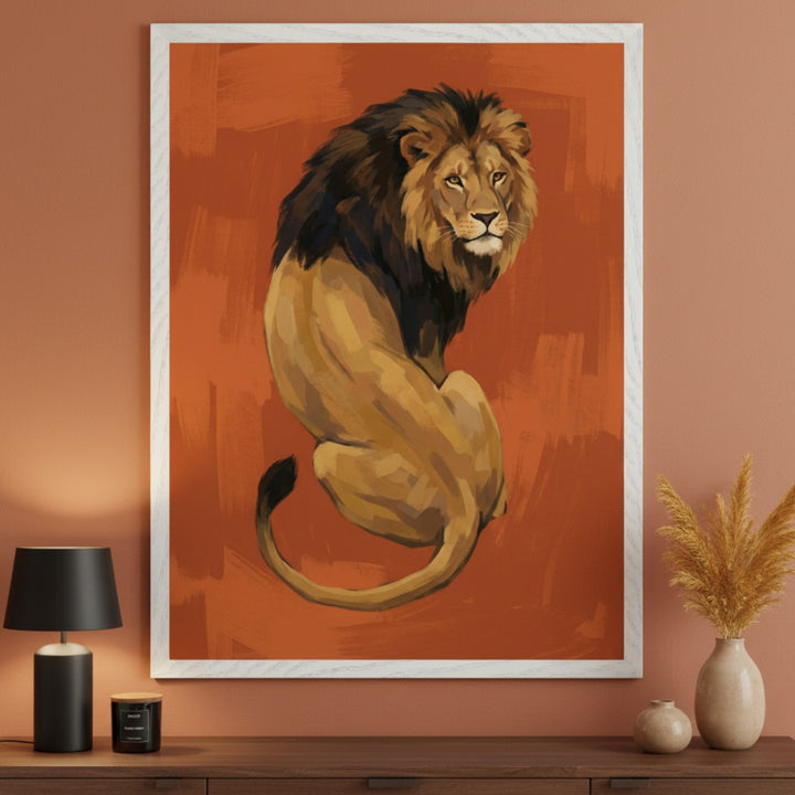 Modern living room with a dark wood console table. A large white-framed painting of a seated lion with a dark mane and golden body on an orange, brushed background hangs above it. A black lamp and decorative vases are on the table.