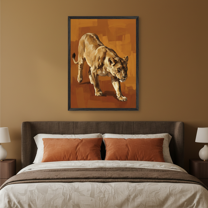 Modern bedroom with a dark brown upholstered bed and white bedding. Centered above the bed is a framed painting of a walking lioness on an abstract orange and brown background.