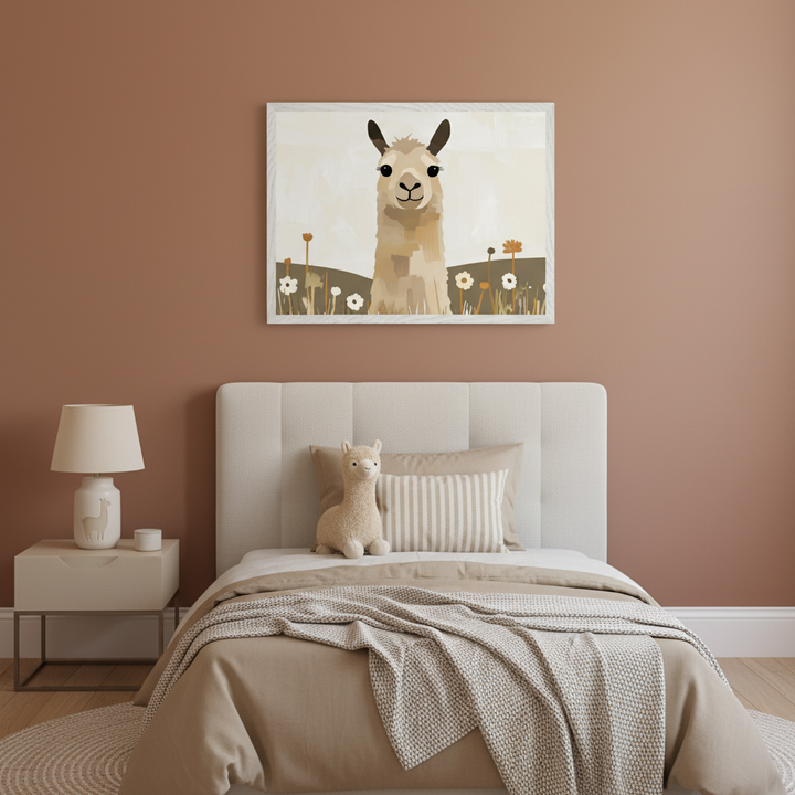 Kid's bedroom featuring an upholstered bed and a nightstand. A large framed illustration of a llama in a field with white and orange flowers hangs above the bed. A matching llama plush toy is on the bed.