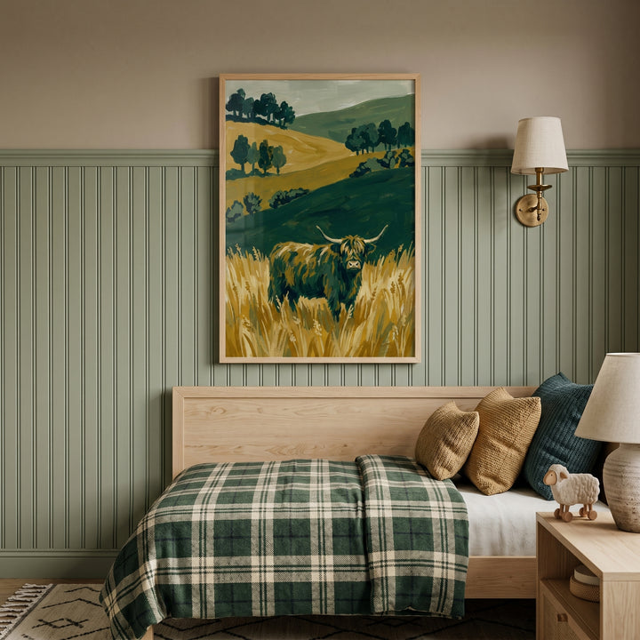 Long horned highland cow wall art hangs above a plaid bed in a sage green room with paneled walls and warm lighting.