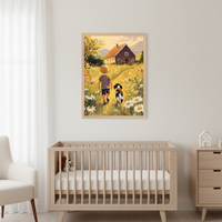 Modern nursery with a light wood crib, cream armchair, and dresser. A framed painting of a blond child and dog walking on a daisy path to a brown house with mountains hangs on the wall above the crib.