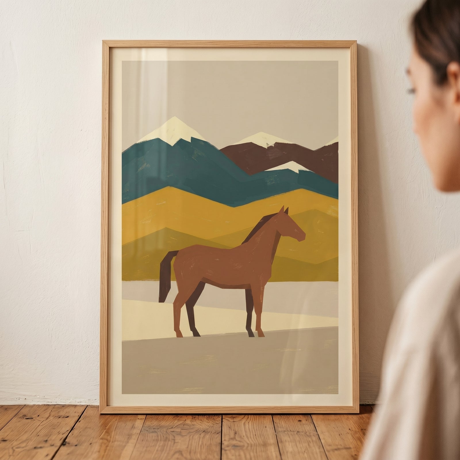 Mid century mountain horse wall art featuring a brown horse standing before layered, geometric peaks in earth tones.