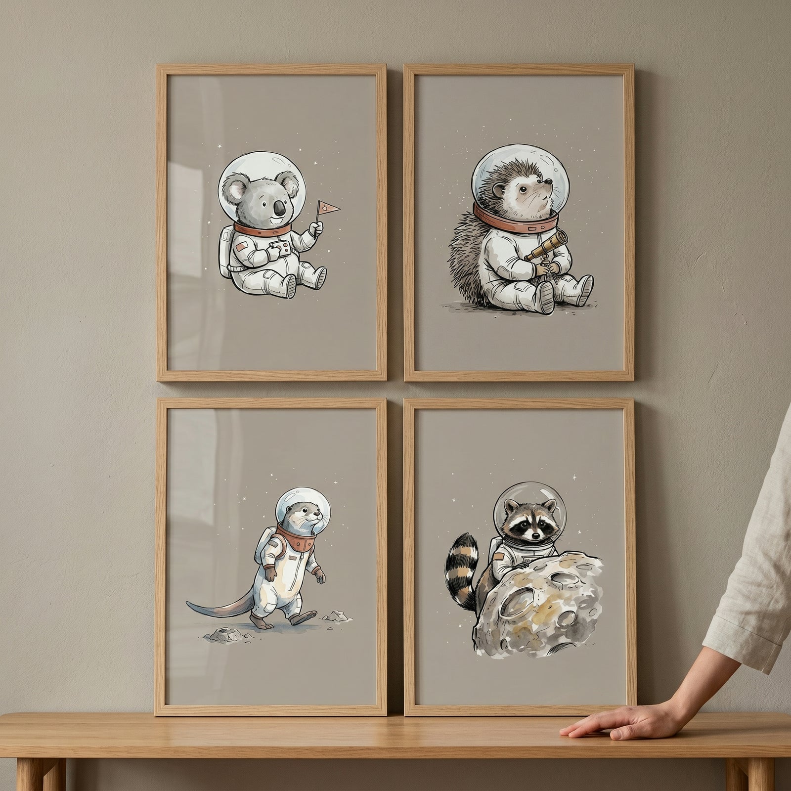 Minimalist astronaut animal wall art set of 4 featuring a koala, hedgehog, otter, and raccoon in space suits.