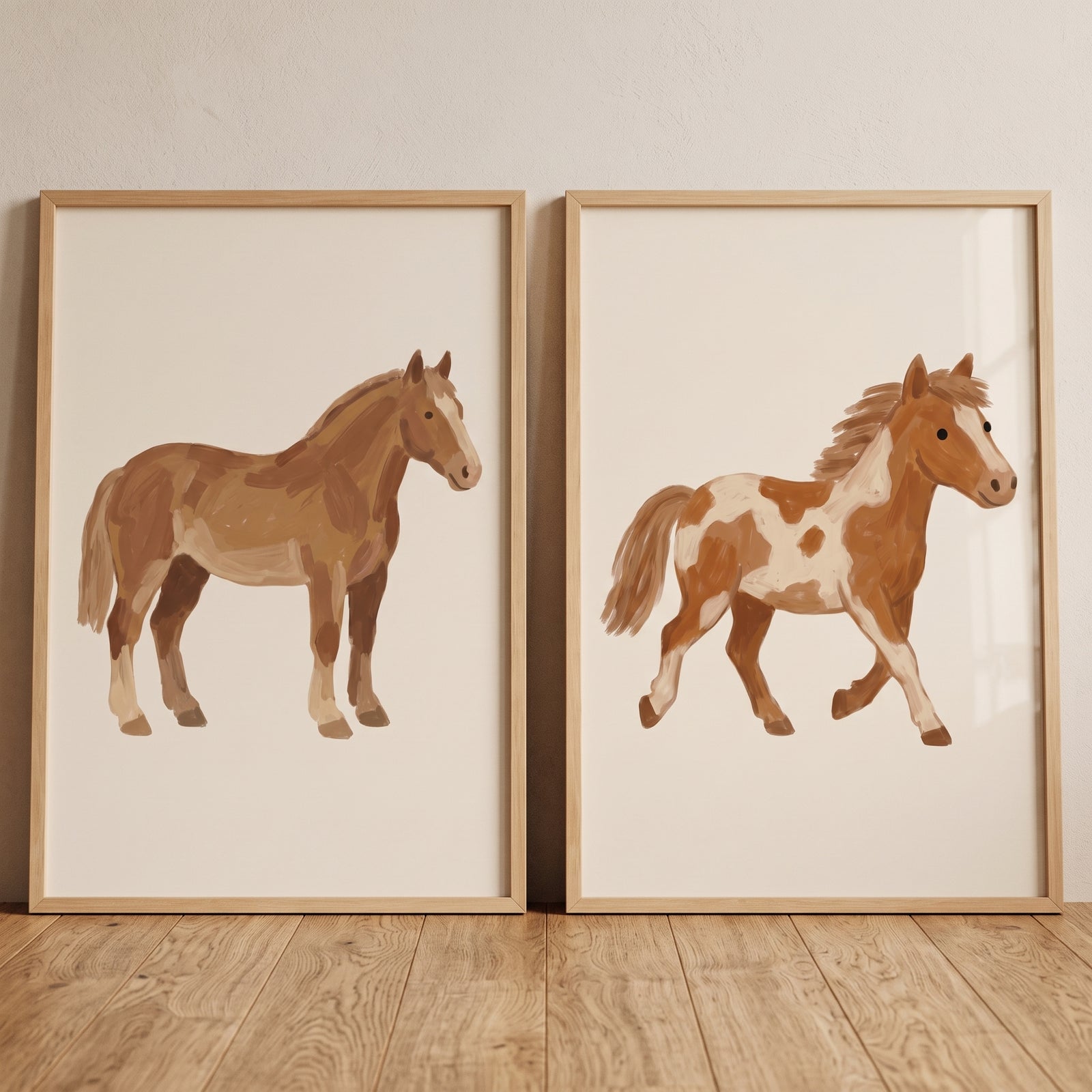 Minimalist brown horse wall art set of 2 features illustrated horses in light wood frames on a wooden floor.