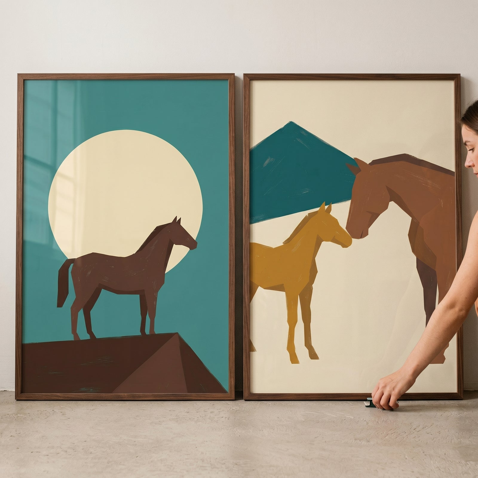 Minimalist mid century horse wall art set of 2 featuring horse silhouettes, a sun, and mountain in teal and beige.
