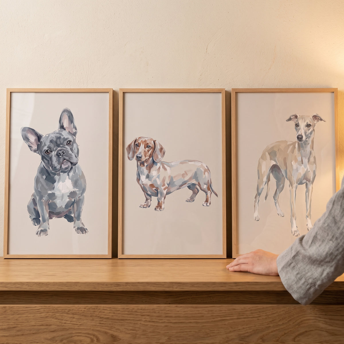 Minimalist natural shades dogs wall art set of 3 in light wood frames featuring a bulldog, dachshund, and greyhound.