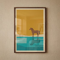 Minimalist ochre sky horse wall art shows a brown horse and its reflection by blue water in a dark wooden frame.
