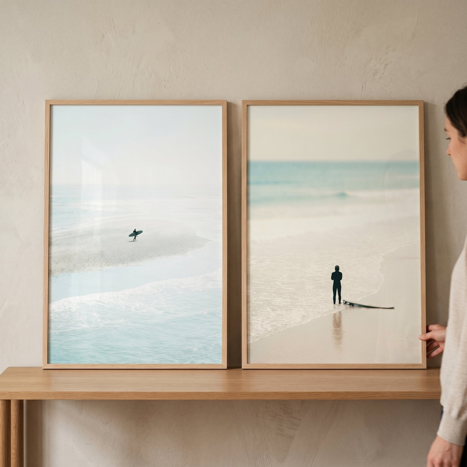 Minimalist pastel beach surfer wall art set of 2 featuring two serene ocean scenes with figures on a hazy shoreline.