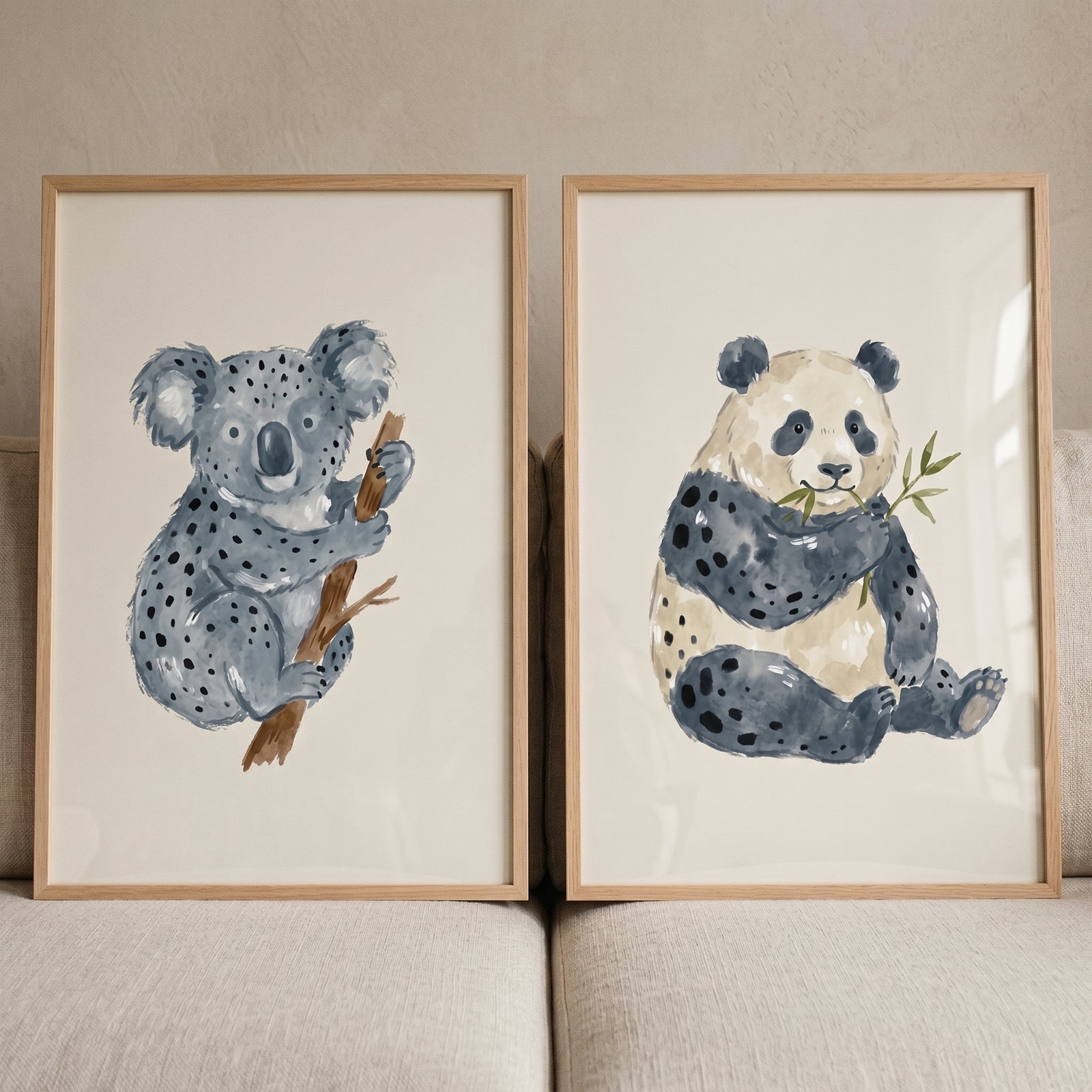 Minimalist stippled neutral animal wall art set of 2 depicting a koala and a panda in wood frames.