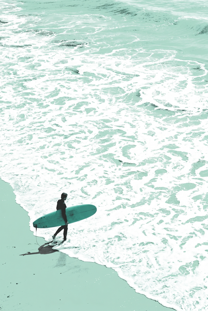 Minimalist teal ocean surfer wall art of a surfer carrying a surfboard into foamy white waves.