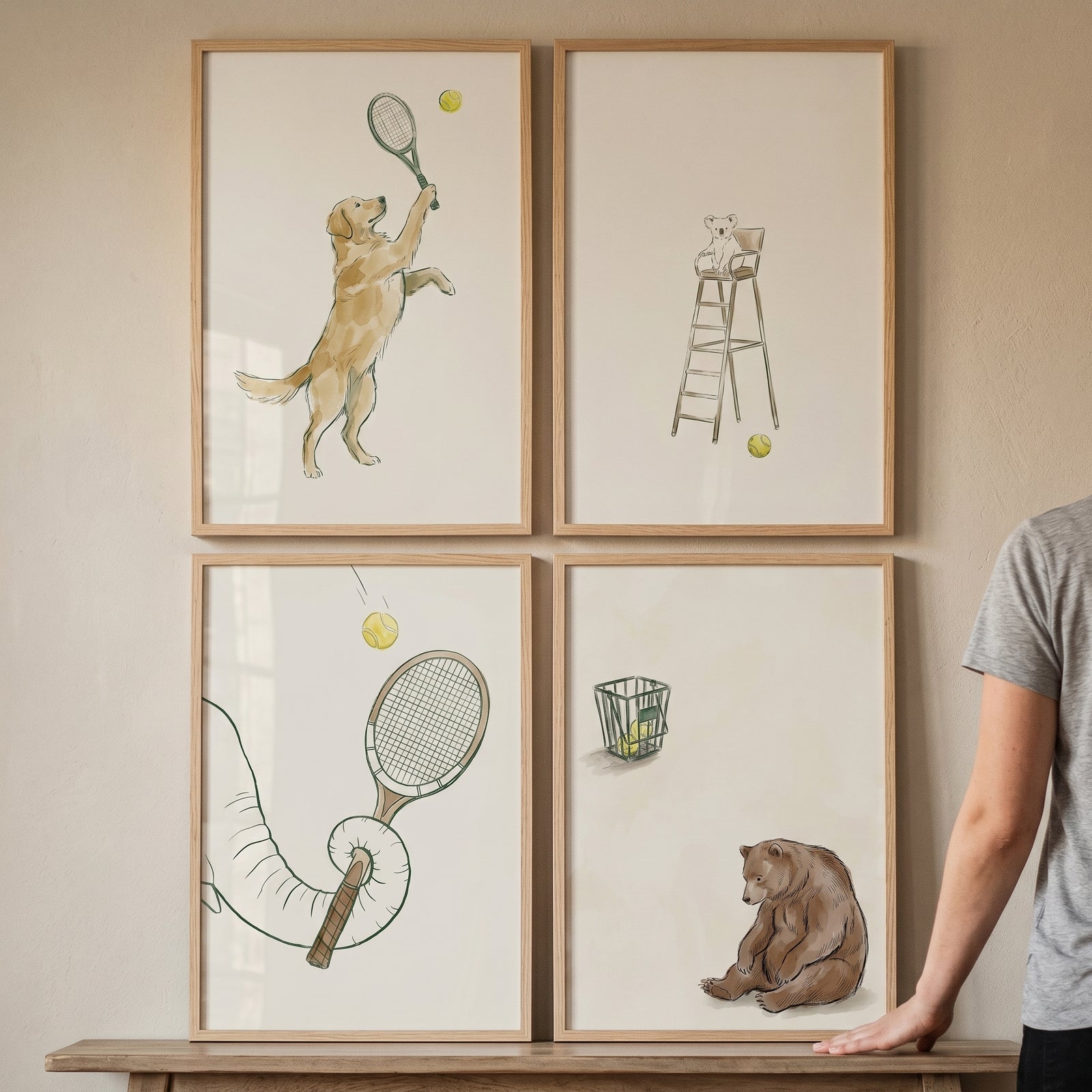 Minimalist watercolor tennis animals wall art set of 4 featuring a dog, koala umpire, elephant trunk, and bear.