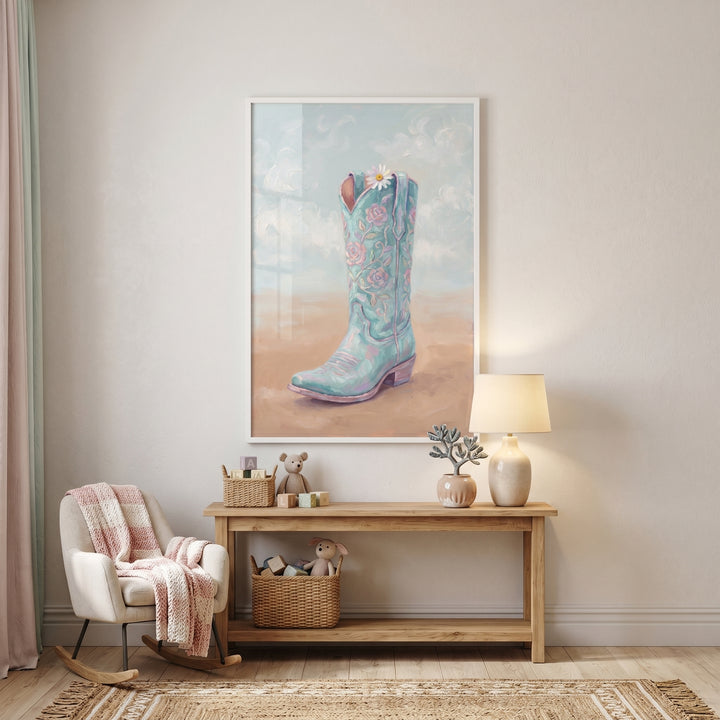 Mint rose cowboy boot wall art hangs above a wooden console table in a neutral room with a cozy rocking chair.