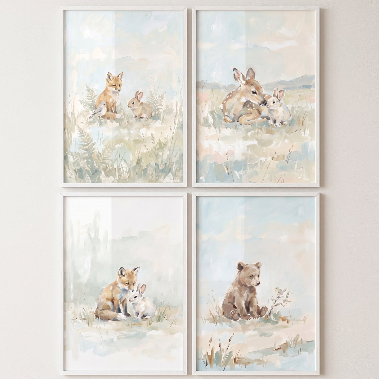 Misty blue baby animals wall art set of 4 with soft woodland illustrations of a fox, deer, bunny, and bear cub.