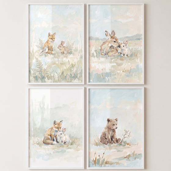 Misty blue baby animals wall art set of 4 with soft woodland illustrations of a fox, deer, bunny, and bear cub.