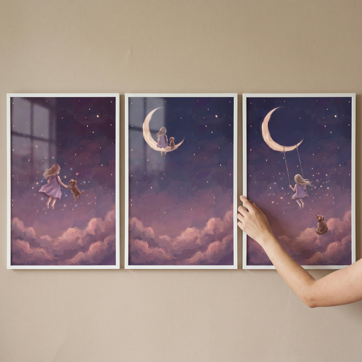Misty mulberry girl dog wall art set of 3 shows a girl and dog among purple clouds and crescent moons in a starry sky.