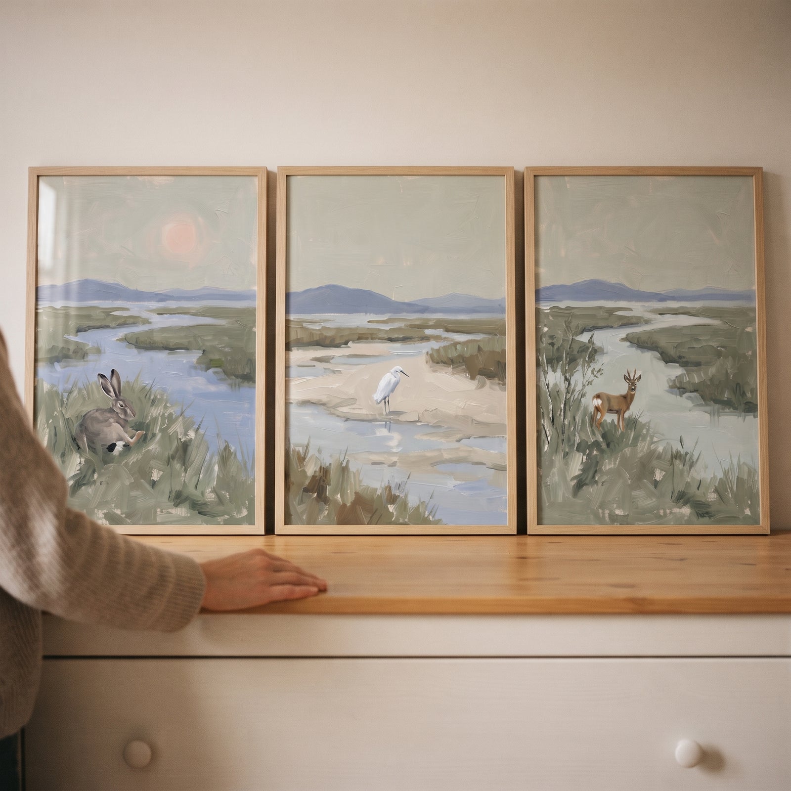 Misty sage wetland wildlife animals wall art set of 3 features a hare, egret, and deer in muted landscape scenes.