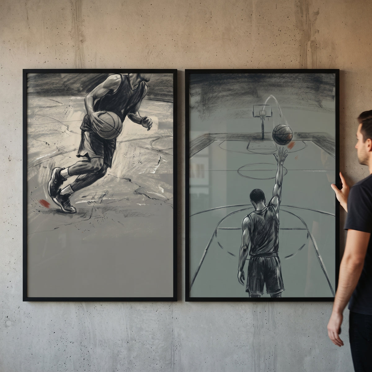 Man adjusts a monochrome basketball player sports wall art set of 2 on a wall showing a player dribbling and shooting.