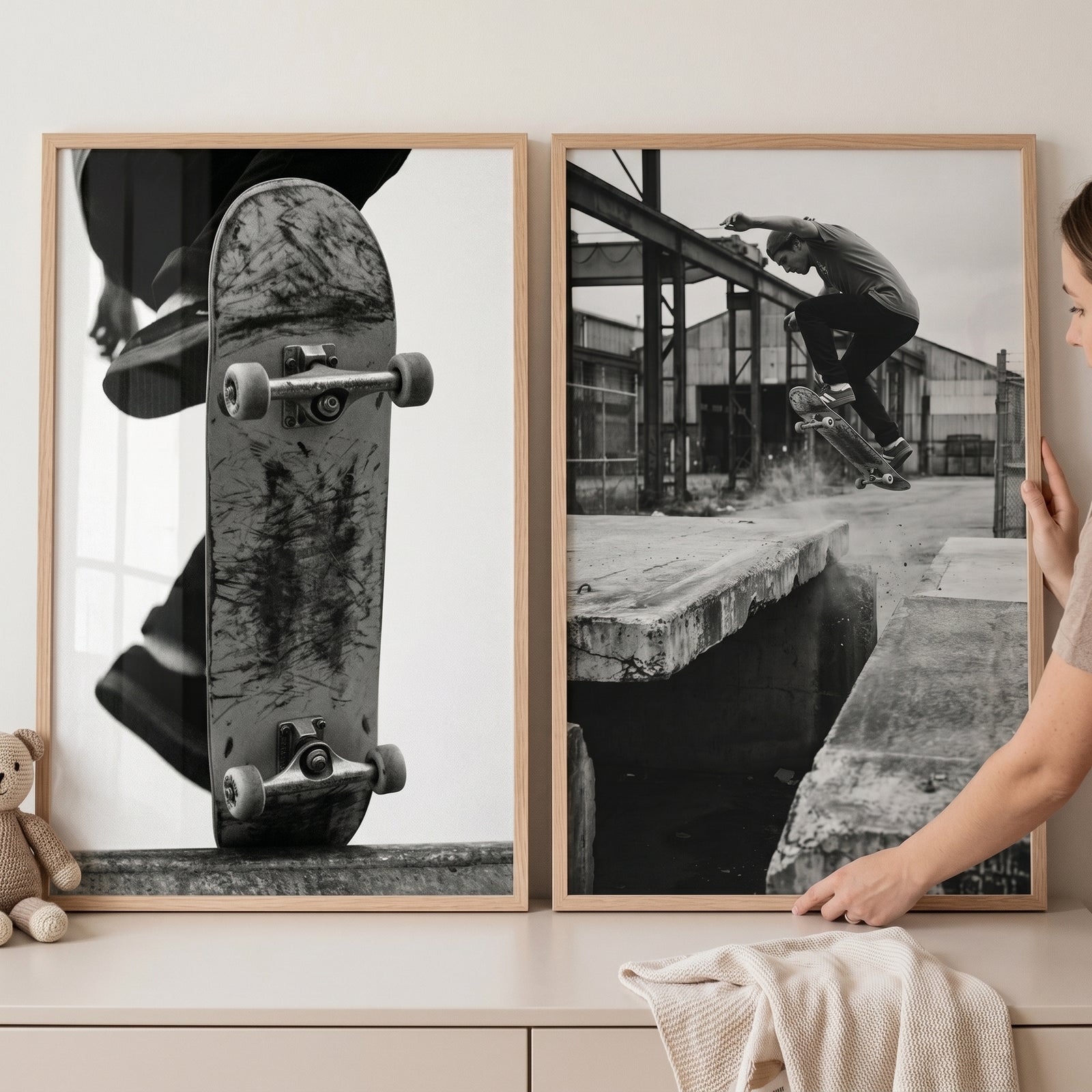Monochrome film grain skateboarder wall art set of 2 featuring a close-up board and an action jump in wooden frames.