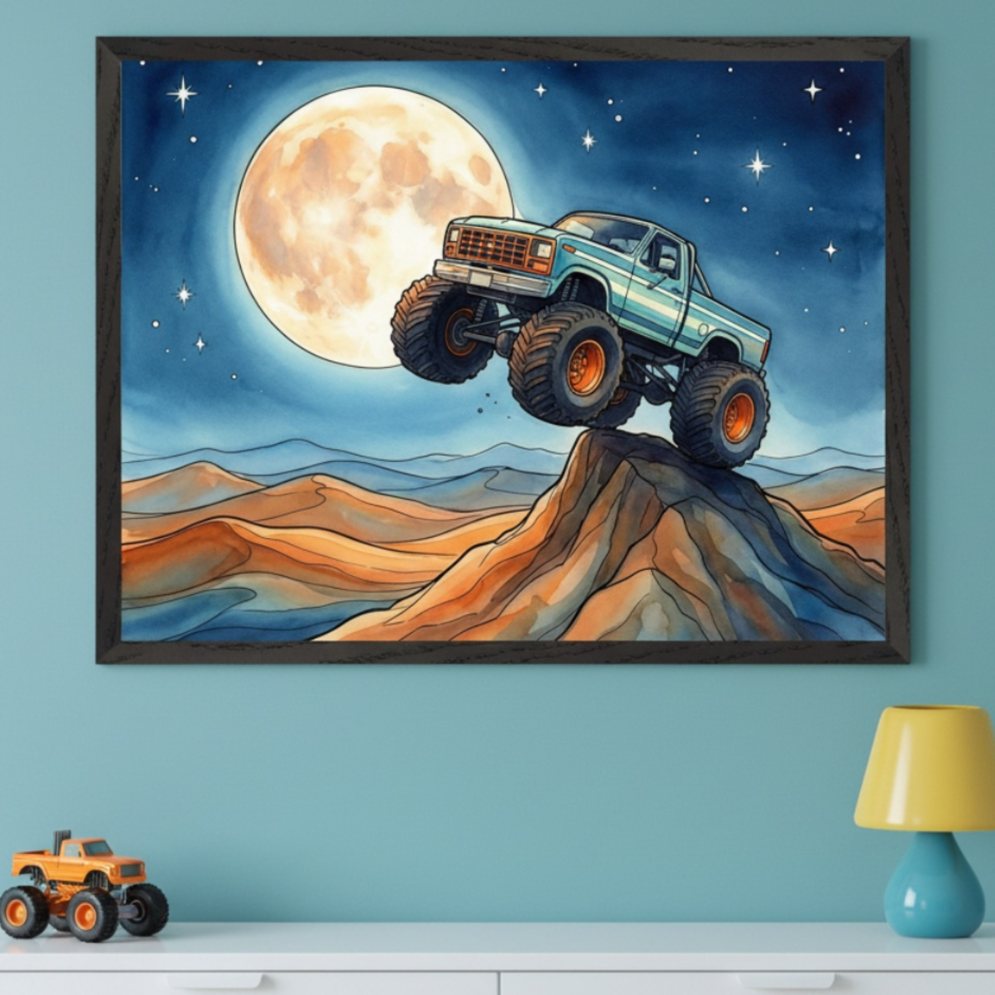 Kid's bedroom with light blue wall and white dresser. A framed watercolor of a blue monster truck jumping a dune under a full moon and starry sky hangs above the dresser. An orange toy monster truck and a yellow lamp are on the dresser.