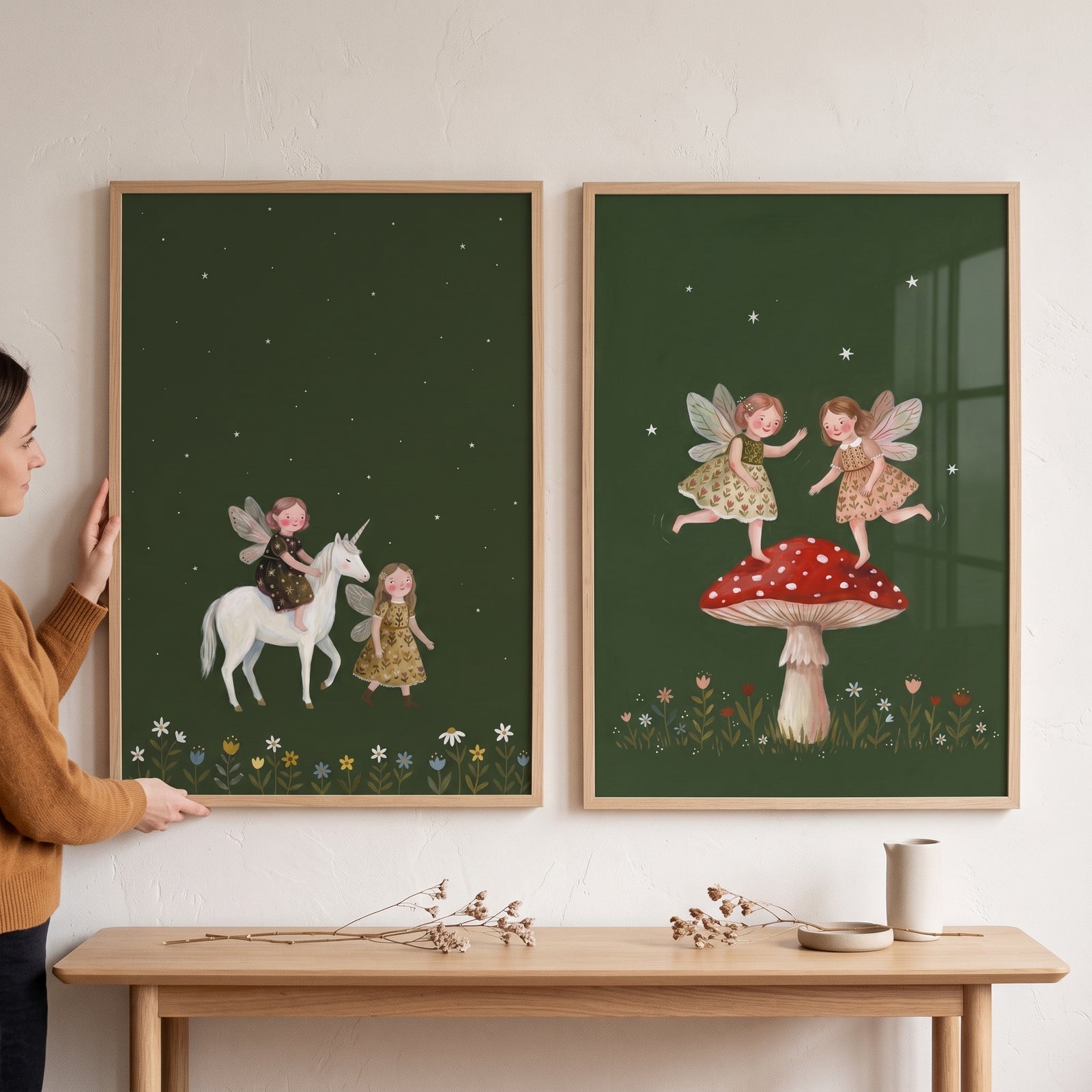 Moody nocturnal winged fairies wall art set of 2 featuring a unicorn and mushroom on dark green backgrounds.