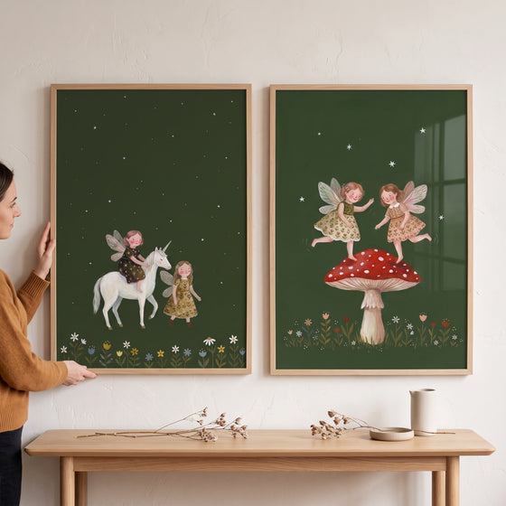 Moody nocturnal winged fairies wall art set of 2 featuring a unicorn and mushroom on dark green backgrounds.