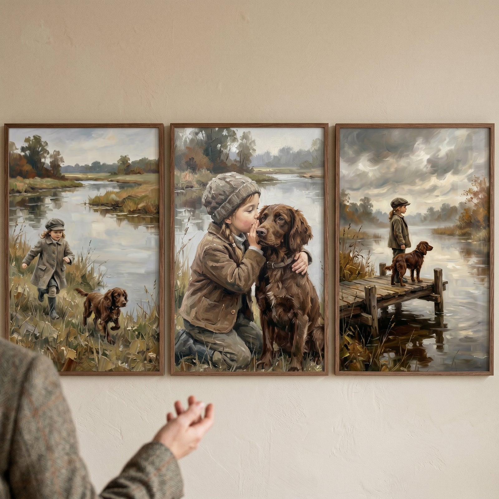 Hand near a moody river child dog wall art set of 3 featuring a child and a brown dog in misty riverside scenes.