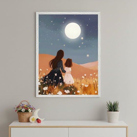 Modern room with a white dresser. A framed art print showing a mother and child looking at a full moon and stars in a flowery field hangs centered above it. A basket of flowers and a potted succulent are on the dresser.