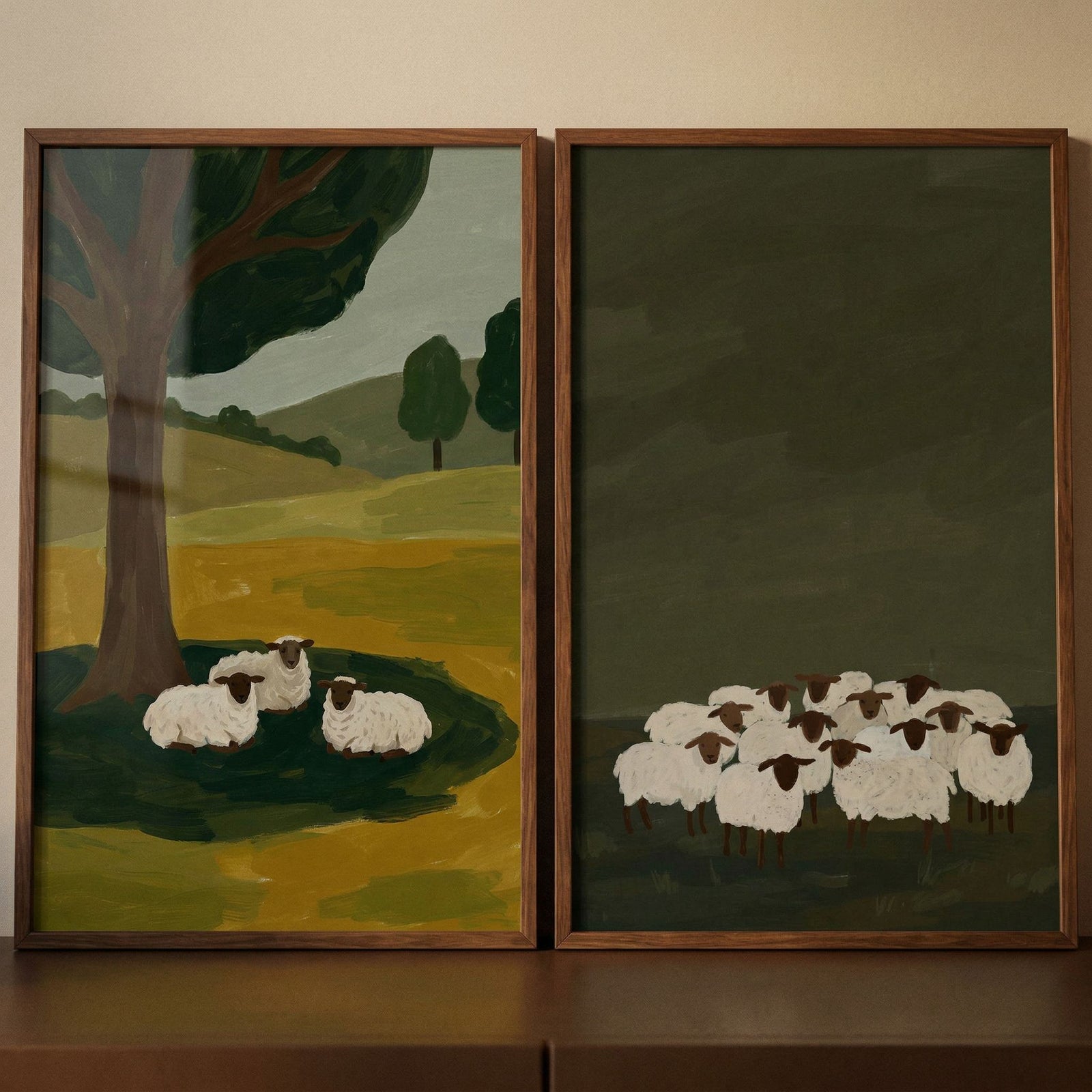 Moss green flock sheep wall art set of 2 featuring sheep under a tree and a larger group on a dark green background.