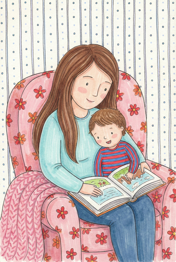 Soft watercolor illustration of a mother and young child sitting together in a pink armchair covered in red and orange flowers while reading an open picture book. The mother wears a light blue sweater and the child wears blue and red striped pajamas against a striped wallpaper background with tiny blue dots that gives the scene a warm cozy storytime feel.

