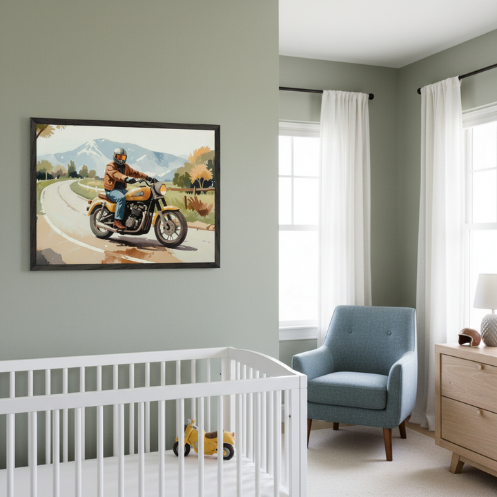 Modern nursery with light green walls. A large framed painting of a man on a yellow motorcycle on a road, with mountains in the background, hangs on the left wall above a white crib. A blue armchair and wooden dresser are to the right.