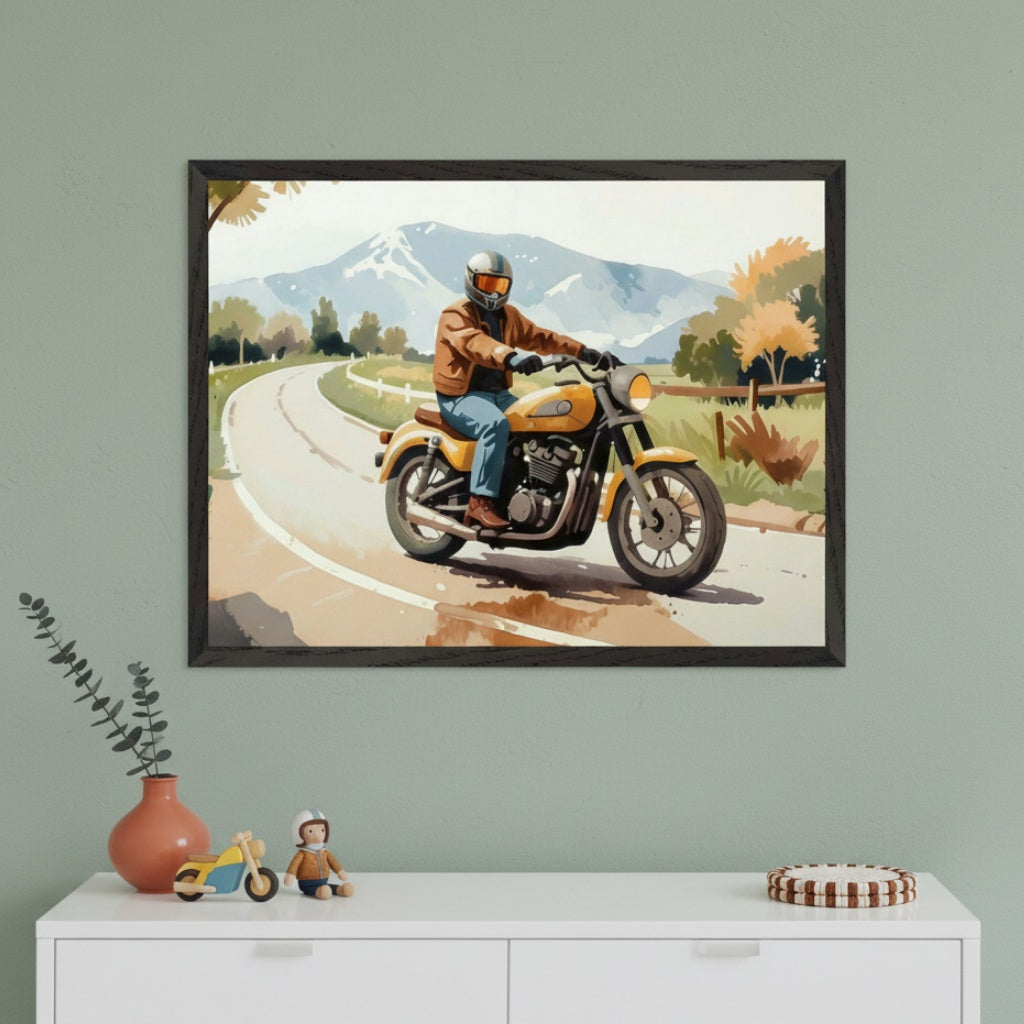 Modern room with a sage green wall and a white dresser. A framed watercolor-style painting of a person riding a yellow motorcycle on a road with mountains in the background hangs above the dresser.