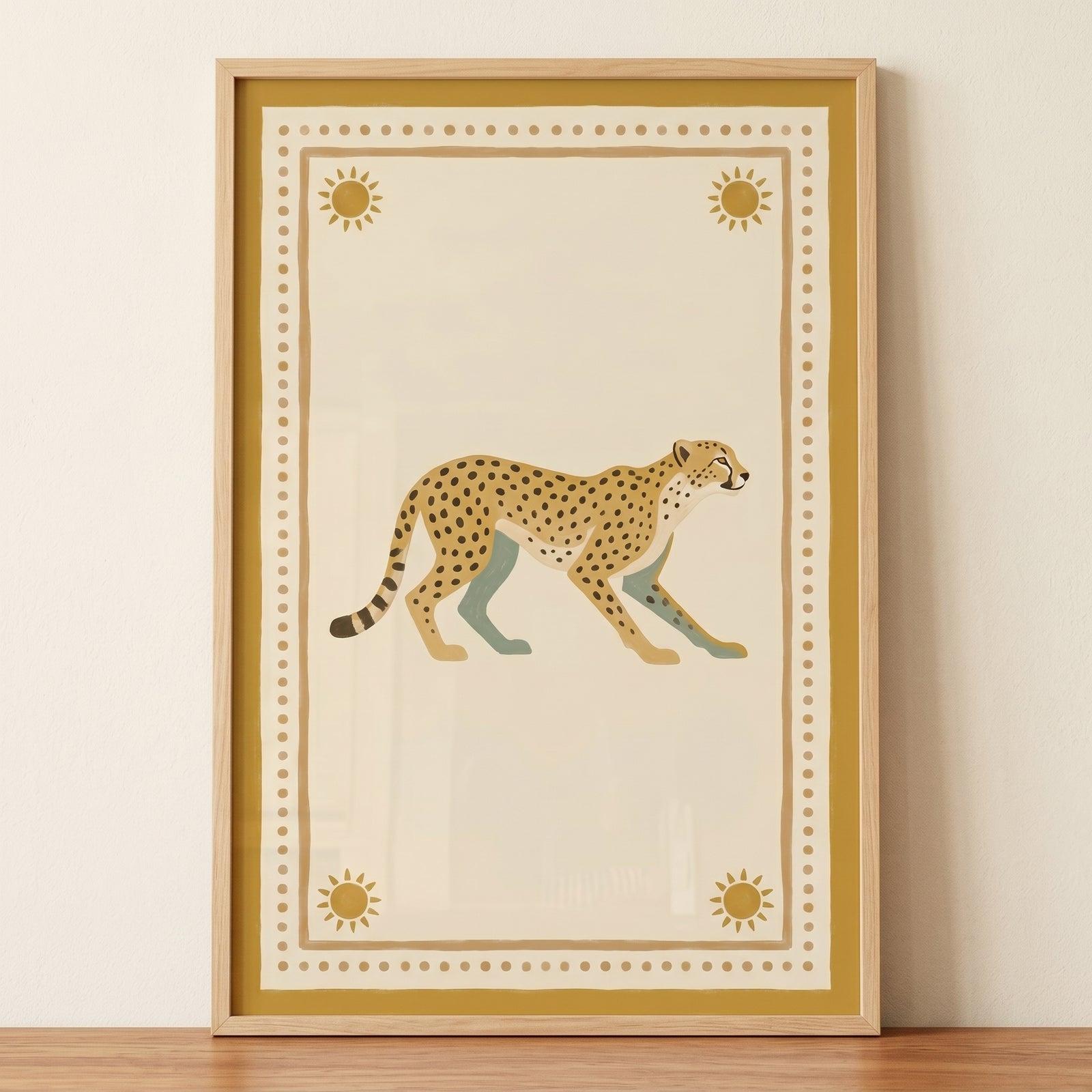Mustard sun border cheetah wall art features a spotted cheetah walking between four sun icons in a light wood frame.
