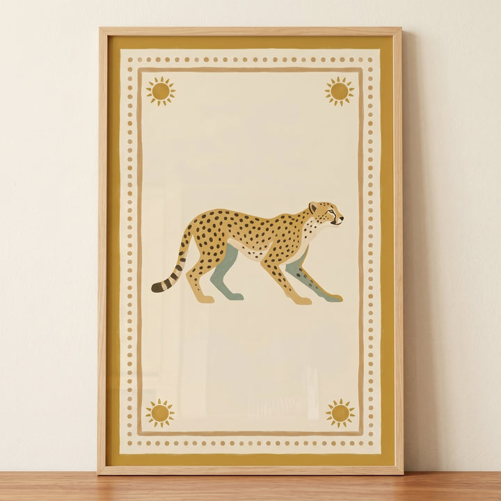Mustard sun border cheetah wall art features a spotted cheetah walking between four sun icons in a light wood frame.