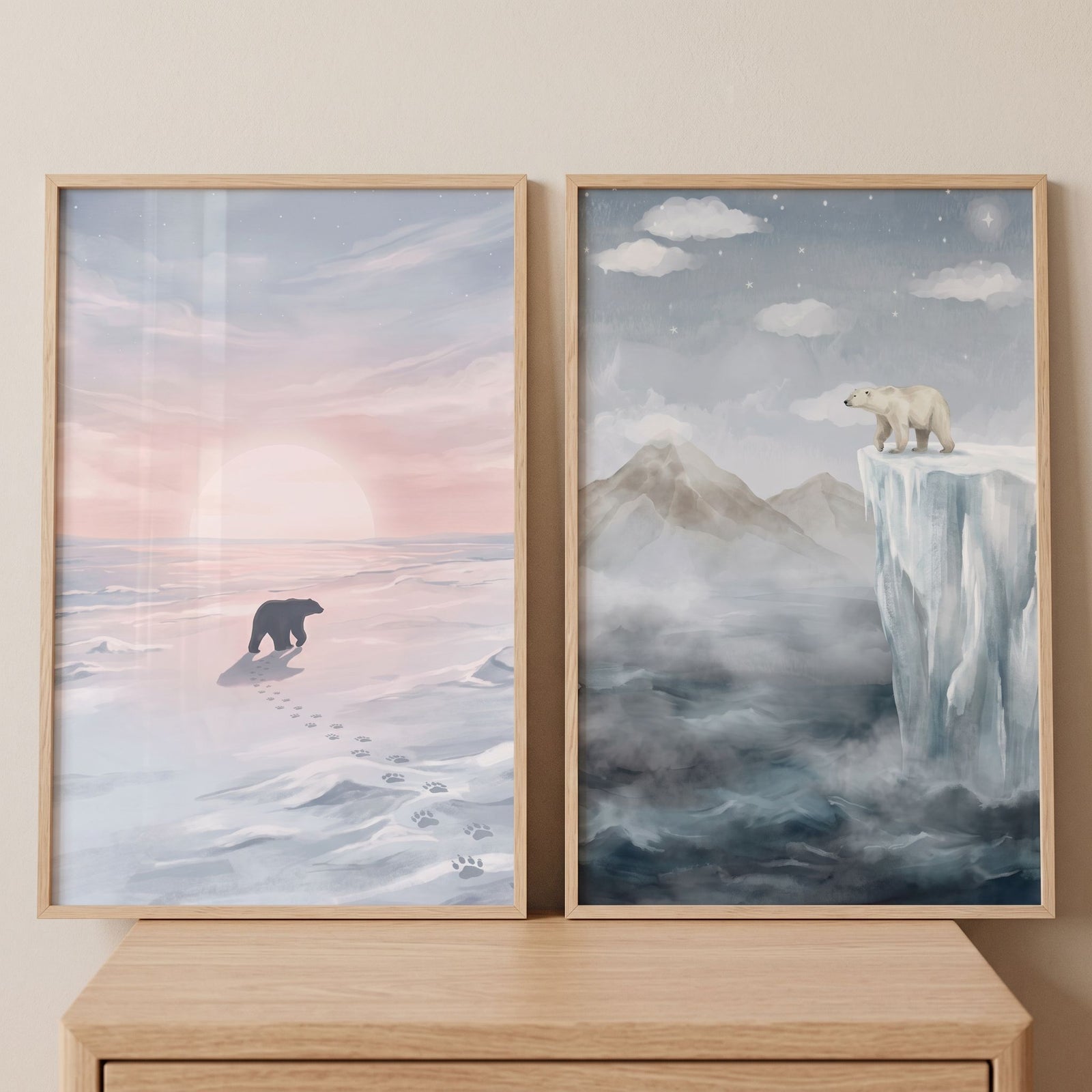 Muted arctic polar bear wall art set of 2 shows bears in snowy landscapes under a sunset and a starry night sky.